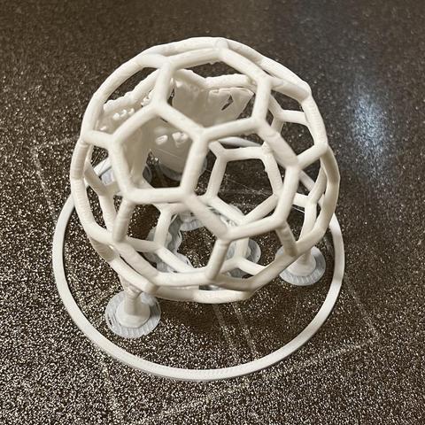 soccer ball edges printed with bambulab printer, image shows ball at textured build plate with support